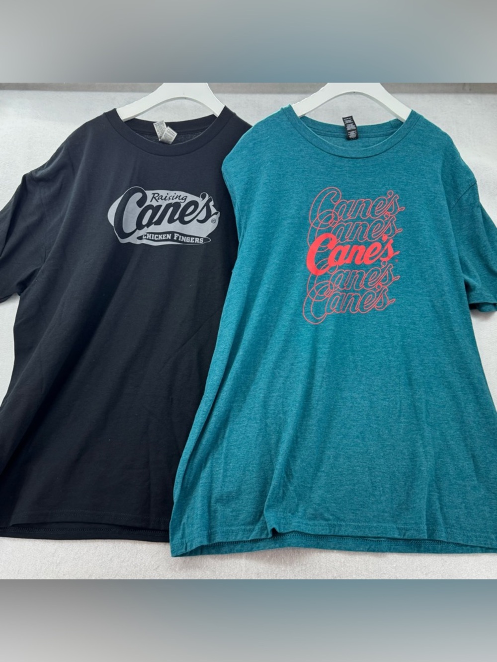 2 - Raising Canes’s Chicken Fingers Adult T-Shirts size Large